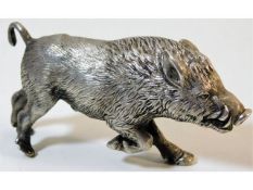 A solid white metal, tests as silver, impressively detailed model of a wild boar made by the late Co