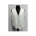 A gents waist coat fitted with six 9ct gold & abal