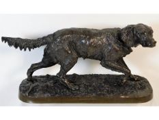 A 19thC. Coalbrookdale bronze figure of setter hun