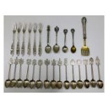 A quantity of silver & white metal spoons & other