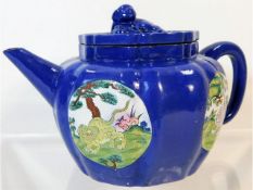 A hand painted Yixing teapot with enamelled panels