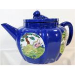 A hand painted Yixing teapot with enamelled panels