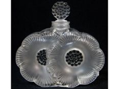 A Lalique crystal scent bottle, signed to base 3.7