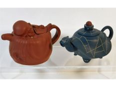 Two small Chinese Yixing teapots, largest 5.75in a