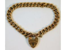A 1918 Robert Pringle Chester 9ct gold curb bracelet with inscription to locket "Greyhound from the
