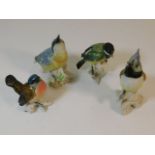 Four Karl Ens porcelain birds, tallest 5.375in