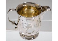 A gilt lined Sheffield silver creamer by John Roun