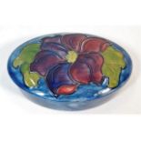 An floral oval Moorcroft pottery trinket box, Pott