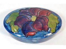 An floral oval Moorcroft pottery trinket box, Pott