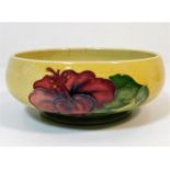 A floral Moorcroft pottery bowl, some crazing, rem