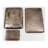 Two silver cigarette cases & one vesta case approx