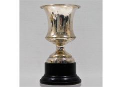 A silver trophy by W. J. Myatt & Co. with stand, s