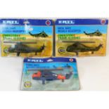 Three cased Ertl helicopters, two military & one r