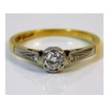 An antique 18ct gold ring with platinum set 0.25ct diamond, size L 1.9g