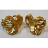 A pair of 18ct gold clip on knot earrings, maker m