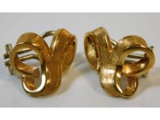 A pair of 18ct gold clip on knot earrings, maker m