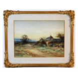 An early 20thC. gilt framed landscape watercolour