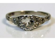 An antique 18ct white gold ring set with approx. 0.75ct old cut centre diamond (approx. 6mm x 4mm) o