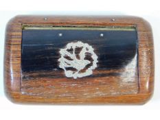 A rosewood snuff box with inlaid white metal decor