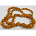 An amber style beaded necklace 26in long, 49.3g, l