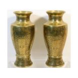 A pair of early 20thC. Chinese brass vases with ch