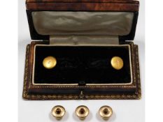 A pair of 18ct gold collar studs 2g, twinned with