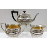 An 1895 Victorian three piece Birmingham silver te