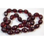 A vintage faceted cherry amber style beaded neckla
