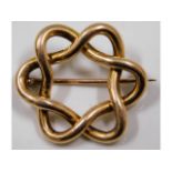 A c.1900 decorative 15ct gold brooch 4.2g