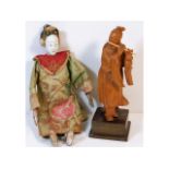 A c.1900 Oriental doll figure 10in tall twinned wi