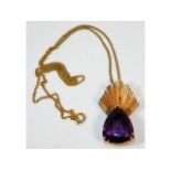 An 18ct gold mounted amethyst with 18ct gold 16.5i