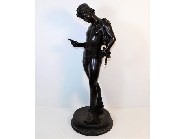 A 19thC. bronze depicting Narcissus the hunter, 24