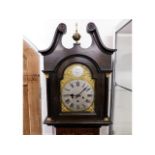 An Edwardian mahogany longcase clock with brass &