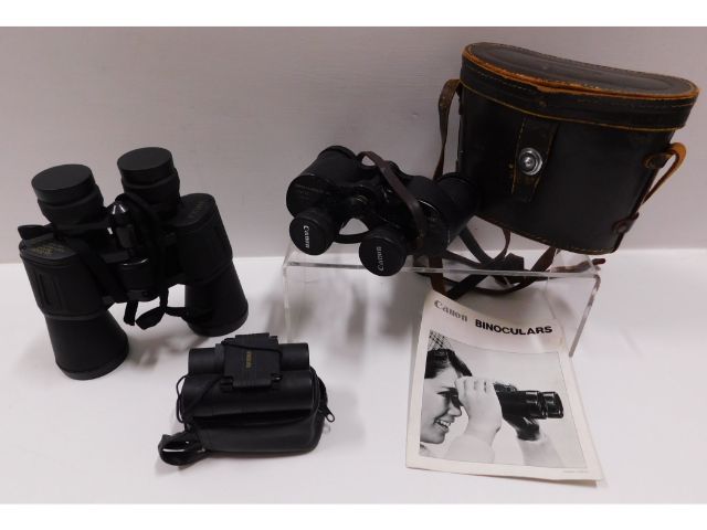 A pair of Canon 8x30 binoculars & a Sakura 10x50x5