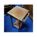 A plant stand with drawer, top 12in square x 28in