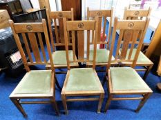 A set of six arts & crafts oak chairs