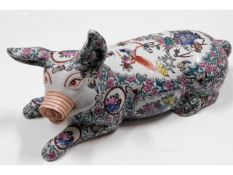 A Chinese polychrome porcelain pig 12.5in long x 6