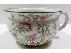 A Royal Doulton chamber pot with floral decor appr