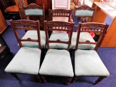 A c.1900 matched four & two set of six oak dining