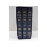 Three cased Folio Society volumes of Pepys diary 1