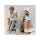 A pair of Lladro figures of children, nos. 5157 &