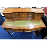 A mahogany Regency style ladies desk by Bowlings,