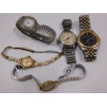 Five wrist watches including a Seiko Kinetic SQ100