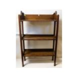 An open oak bookcase, 34.75in high x 21.75in wide x 7.75in deep