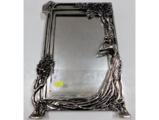 A decorative art nouveau style mirror 16in high x