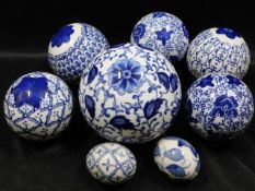 Six Chinese porcelain blue & white balls twinned w