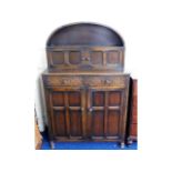 A Dutch style oak dress with cupboards & drawers,