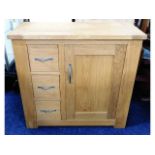 A small oak hall cupboard with drawers, 31.5in wid