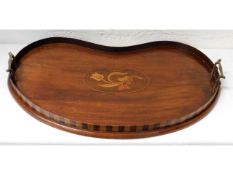 An Edwardian mahogany kidney shaped lap tray 22in