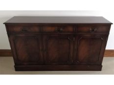 A modern mahogany sideboard, 58in wide x 33.5in hi